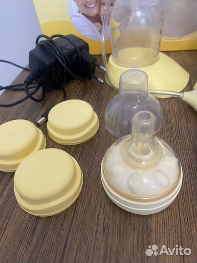 Молокоотсос Medela swing mаxi