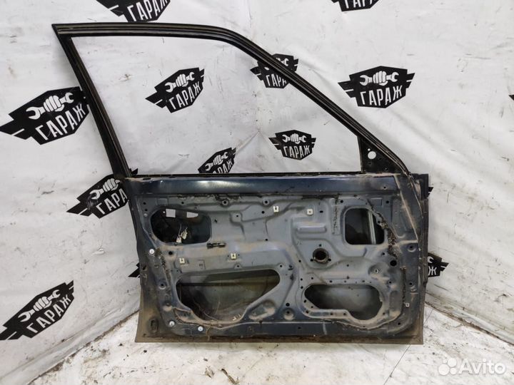 Дверь передняя левая Mazda 323