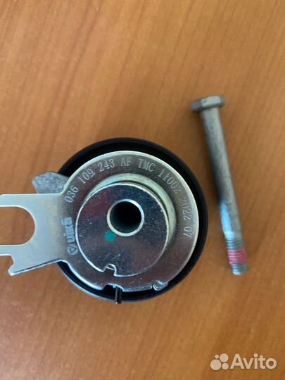 Натяжной ролик ремня грм