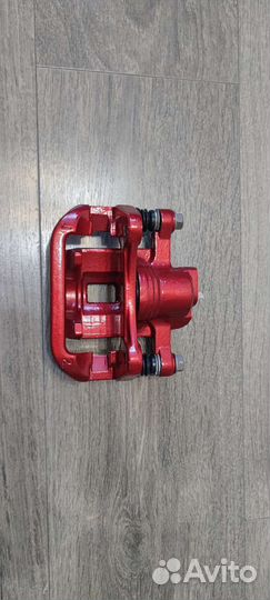 Задний левый суппорт Шевроле Лечетти