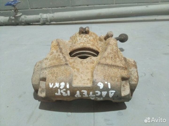 Суппорт тормозной передний левый Renault Duster