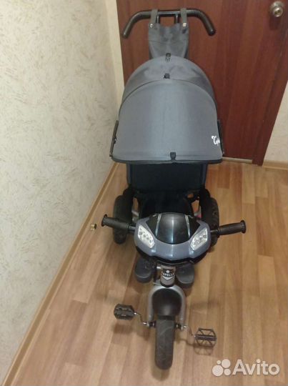 Трехколесный велосипед с ручкой