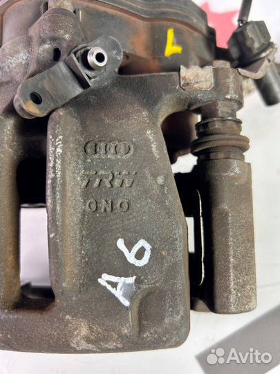 Суппорт тормозной задний левый Audi A6 Avant C7