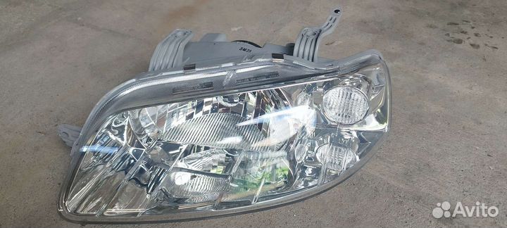 Фара передняя левая aveo T250