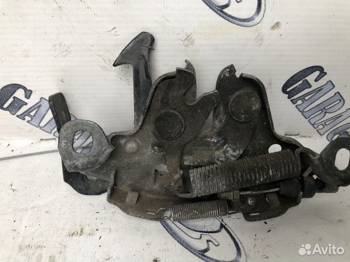 Замок капота nissan tiida