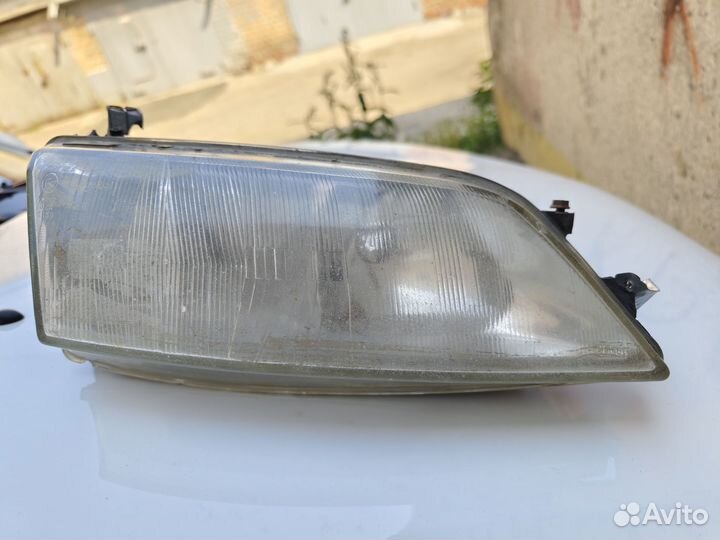 Фара ориг. правая 