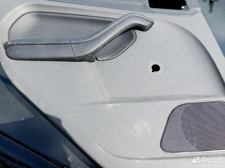 Обшивка двери Ford Focus 2