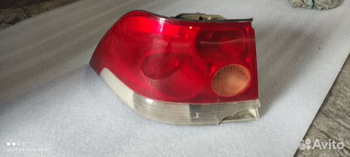 Фонарь задний левый opel astra h седан