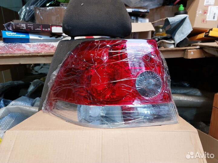 Фонарь задний левый Opel Astra H седан