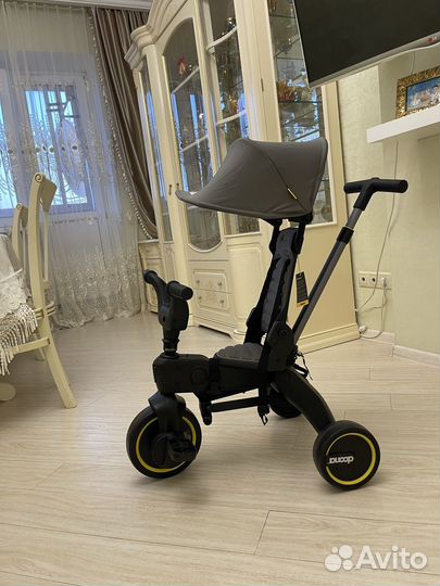 Складной трехколесный велосипед Doona