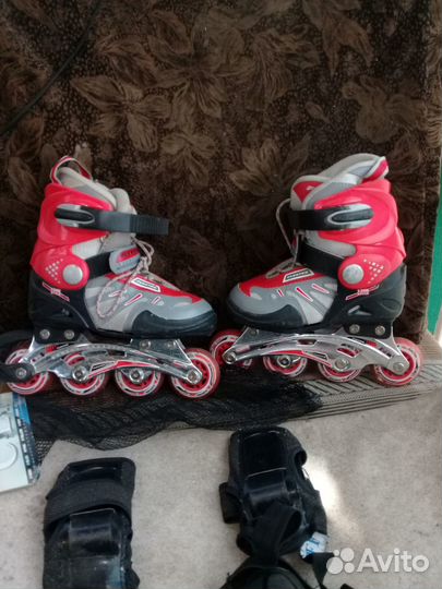Роликовые коньки