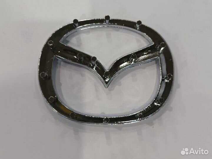 Эмблема на руль mazda 6