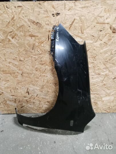 Киа Каренс 2 Kia carens крыло левое