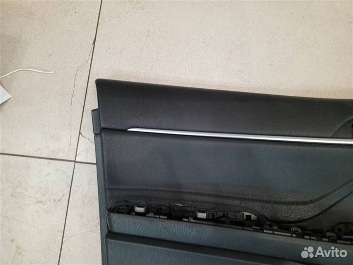 Обшивка двери передней левой Toyota Camry XV70 20