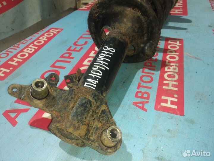 Стойка передняя левая Ниссан Премьера P12