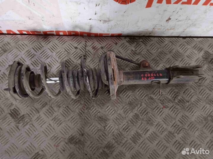 Стойка задняя левая Тойота Королла AE110