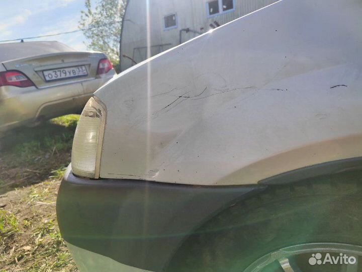 Крыло переднее правое Renault Logan 1.6 K7M 710