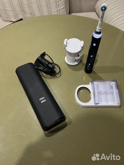 Электрическая зубная щетка Braun Oral B Genius