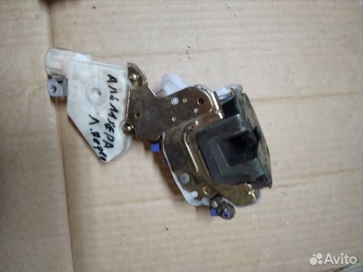 Замок передний левый Nissan Almera classic