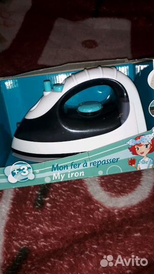 Деская игрушка утюг