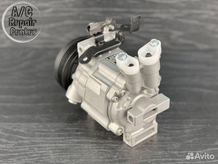 Компрессор кондиционера Subaru Impreza