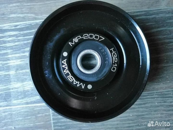 Ролик натяжитель ремня генератора Nissan