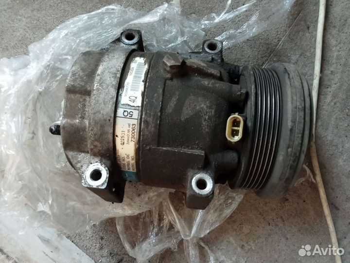 Компрессор кондиционера Шевроле эпика