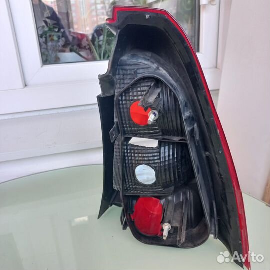 Фонарь левый задний на Renault logan