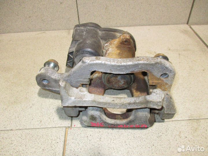 Суппорт задний правый Nissan Qashqai (J11)