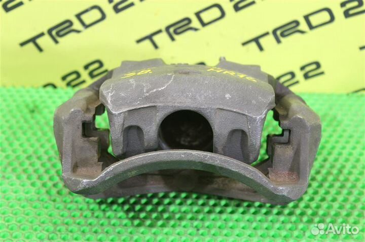 Суппорт тормозной передний левый Nissan Juke F15