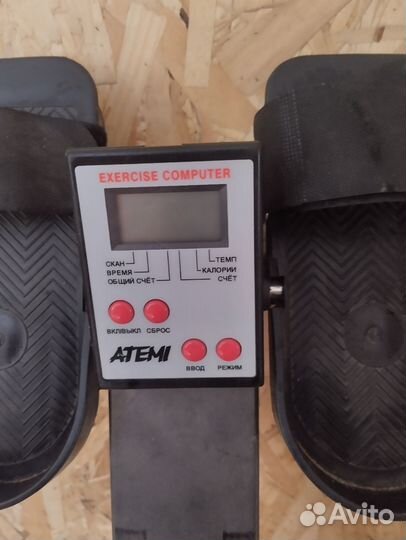 Гребной тренажер