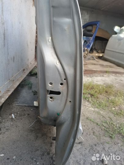 Передняя правая дверь Kia Spectra