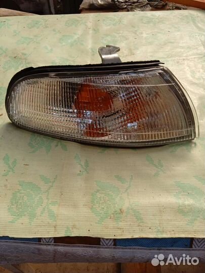 Левый поворотник Мазда 626