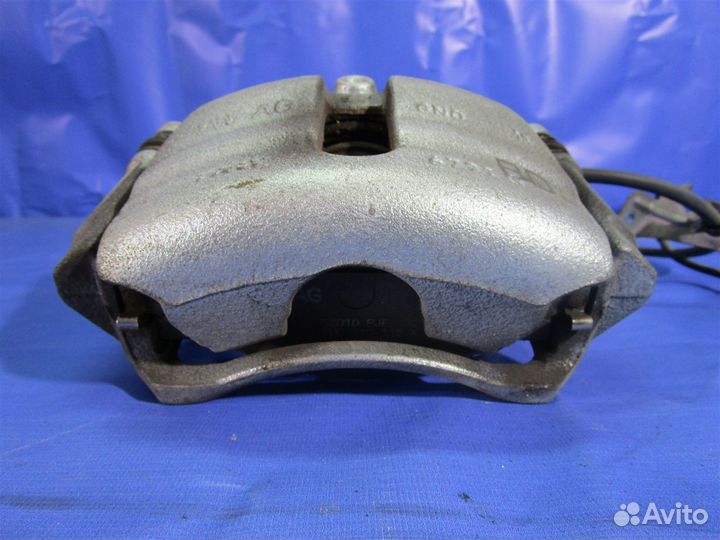 Суппорт тормозной передний левый Volkswagen Golf 7