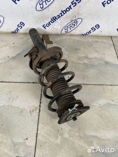 Амортизатор передний левый Mazda Mazda3 BL 1.6