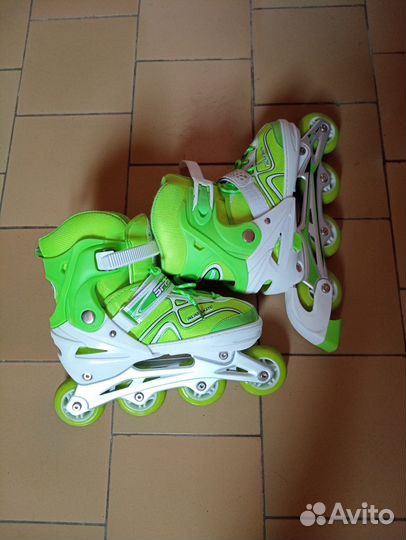 Роликовые коньки