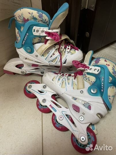 Роликовые коньки