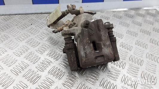 Суппорт тормозной задний левый toyota urban cruise