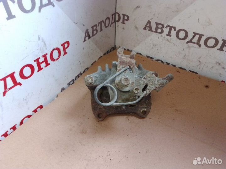 Суппорт тормозной задний левый Volkswagen Passat