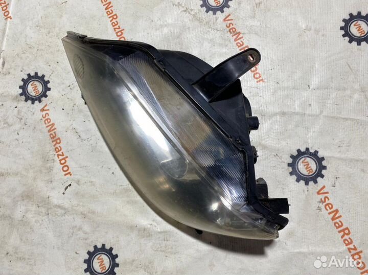 Фара передняя левая Mazda Demio DY3W
