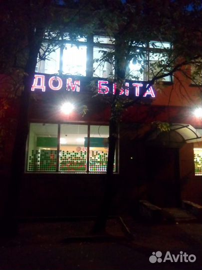 Швея портной в ателье