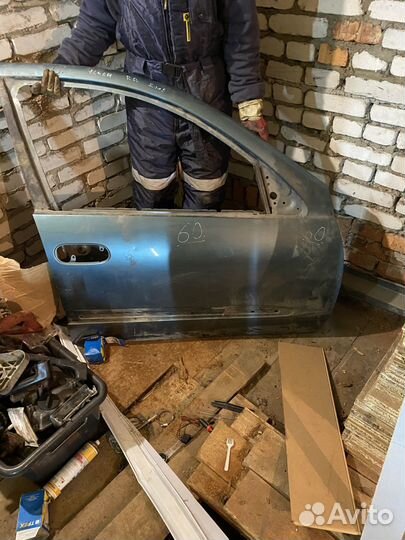 Дверь на nissan almera n16