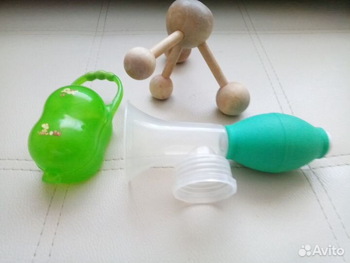 Ионизатор.Молокоотсос, массажер, футляр для соски