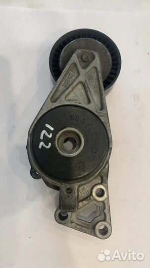 Ролик-натяжитель ручейкового ремня VW Passat (B6)