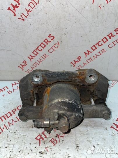 Суппорт тормозной передний левый Ford Escape L3