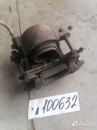 Суппорт передний левый GMC 4.3 AT SL/SLE 01.1995