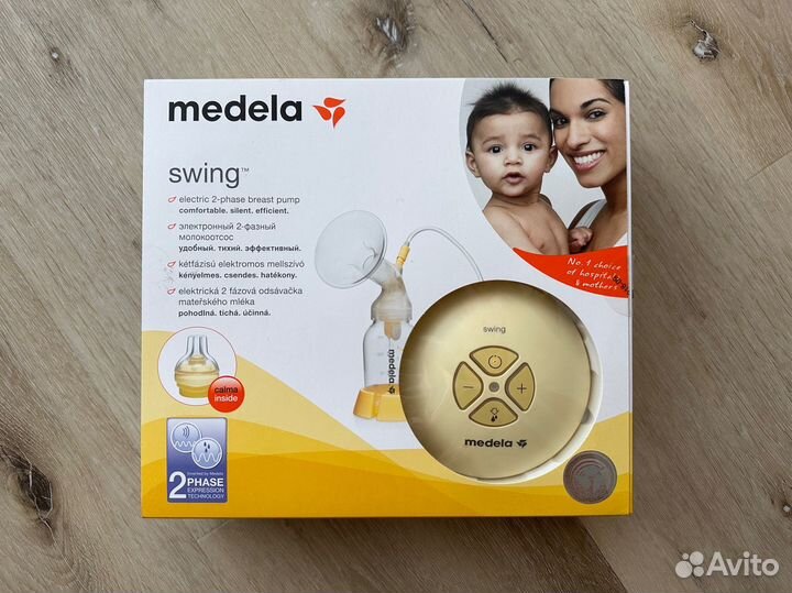 Молокоотсос электрический medela swing