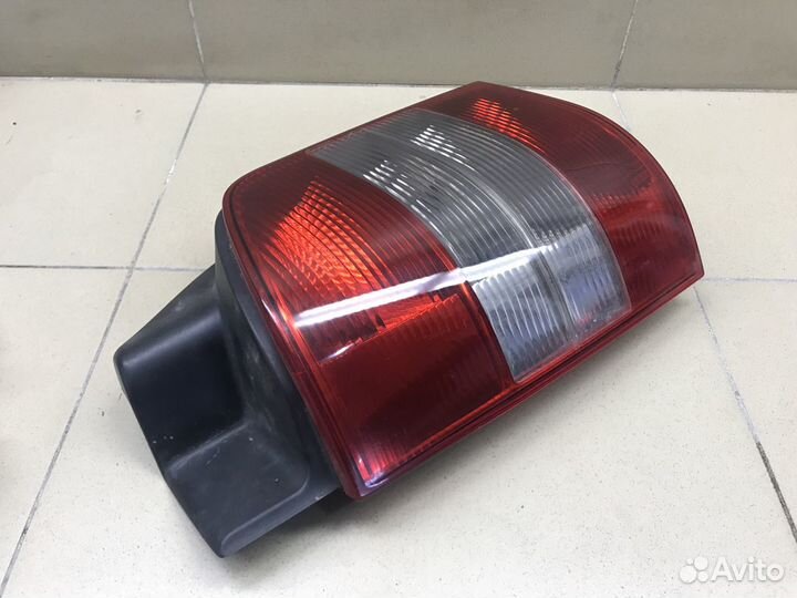 Фонарь задний наружный левый Transporter T5 2003-2