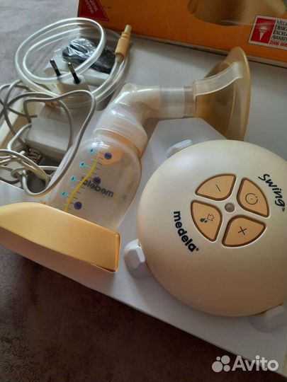 Молокоотсос medela swing электрический