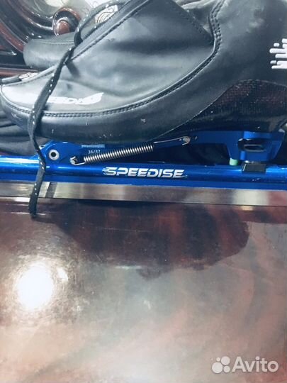 Конькабежные ботинки